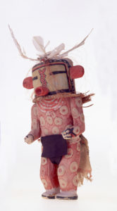 Tall doll, pink in color with white spots