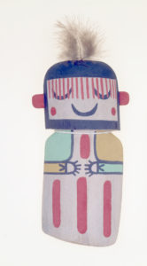Smiling wooden doll