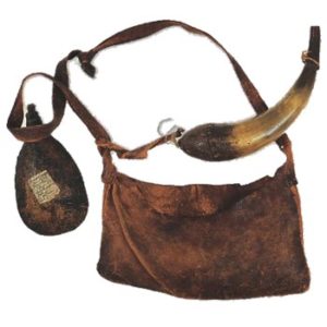 Small round bag, larger rectangular bag, and horn