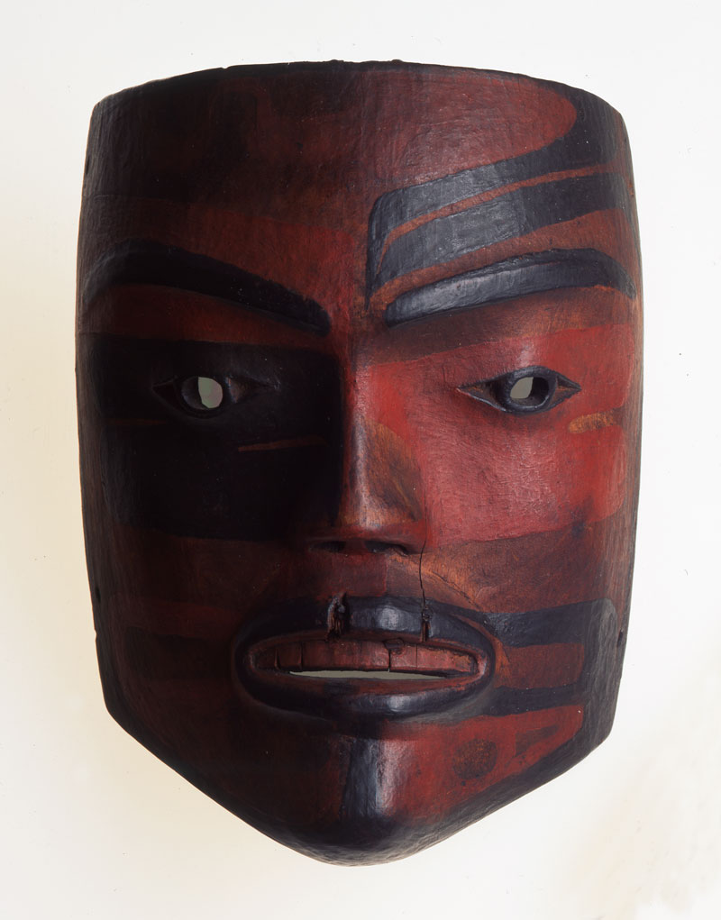 wooden mask resembing a human face