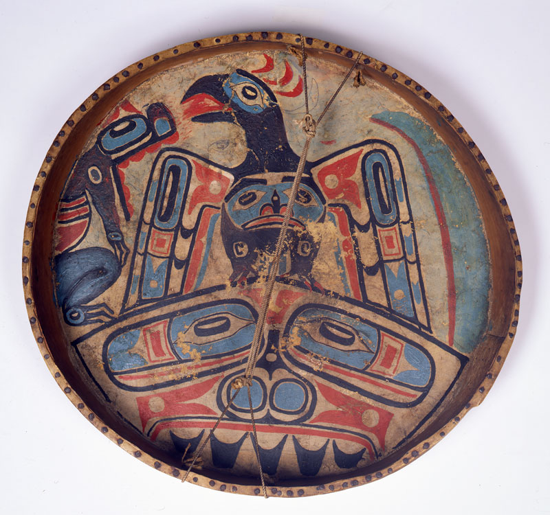 circular drum decorated with a bird painting