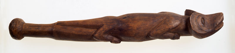 Carved wooden club shaped like an animal