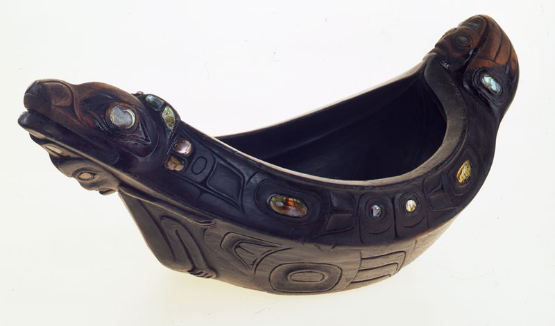 wooden carving, painted black, and hollowed out to make a bowl