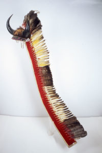 Buffalo horn headdress with trail of feathers
