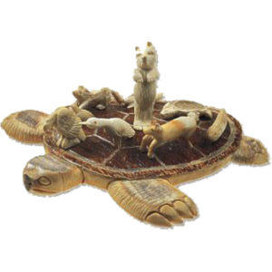 Sculpted turtle wth animal sculptures on back